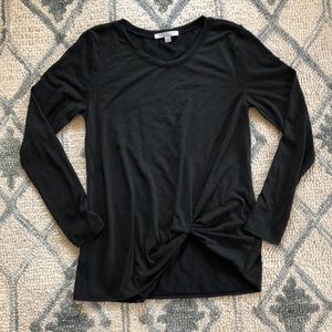 Long sleeved shirt with side knot.